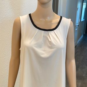 BR cream blouse with black trim sleeveless blouse.